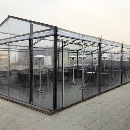 The Emperor Tiananmen Beijing Hotel Bagian luar foto A polycarbonate greenhouse